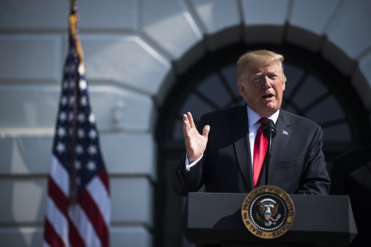President Trump speaks about the economy on the South Lawn of the White House on Friday. He unleashed a Twitter tirade Sunday after the New York Times' publisher revealed details of a July 20 meeting between the two. (Washington Post photo by Jabin Botsford)