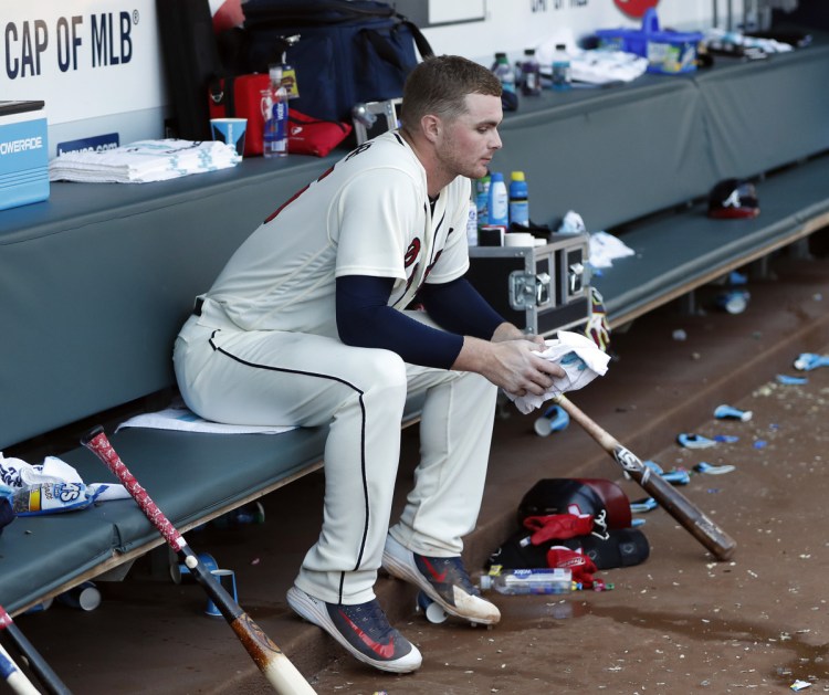 Braves pitcher Sean Newcomb sits on the bench after losing his bid for a no-hitter in the ninth inning of Sunday's game against the Dodgers in Atlanta. The Braves won 4-1.