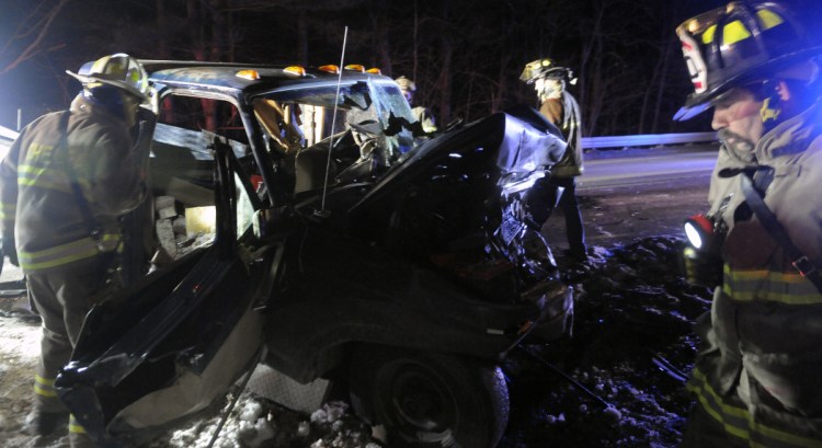 Firefighters check pickup trucks that collided on Jan. 4, 2016, on Route 9 in Chelsea, injuring three people. All the victims had to be extricated from the vehicles, police said, to be treated for multiple, life-threatening injuries.