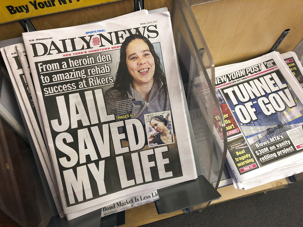 Copies of the  New York Daily News are for sale at a newsstand in New York, Monday, July 23, 2018, after the paper told employees that the newspaper is reducing its editorial staff by 50 percent. 