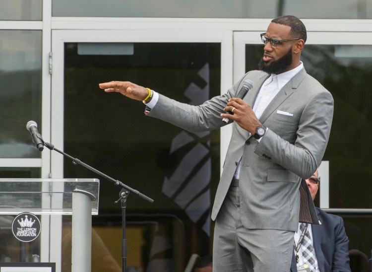 LeBron James speaks at the opening ceremony for the I Promise School on Monday in Akron, Ohio. The I Promise School is supported by the The LeBron James Family Foundation and is run by the Akron Public Schools. 