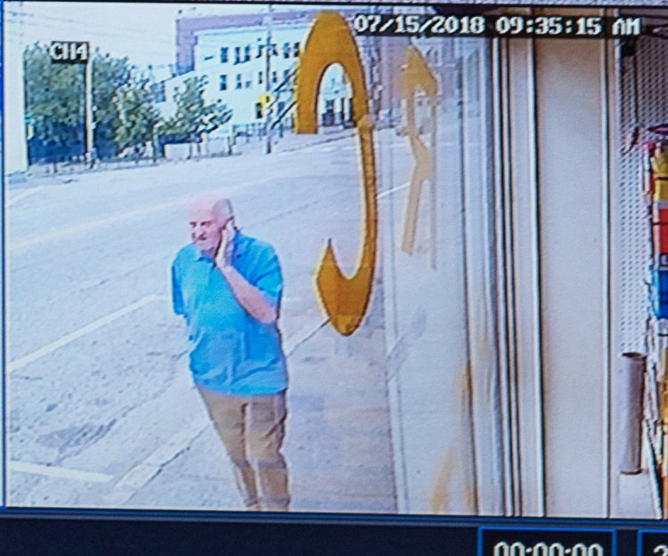 In this surveillance video from a store on Sabattus Street, Albert Flick paces back and forth on the sidewalk moments before Kimberly Dobbie was stabbed to death Sunday morning in Lewiston. 