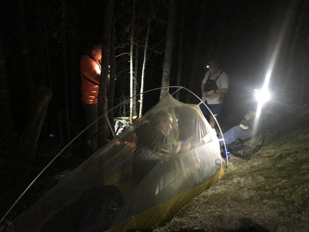 Emergency rescue responders set up shelter for Jennifer Custer, 38, of London, England early Friday after she broke her ankle on Bigelow Mountain in Wyman Township.
