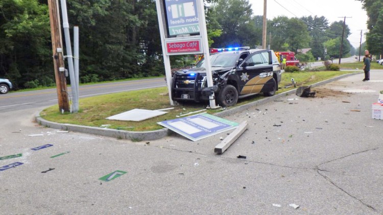 This cruiser struck another car and a sign during a wreck in Windham. 