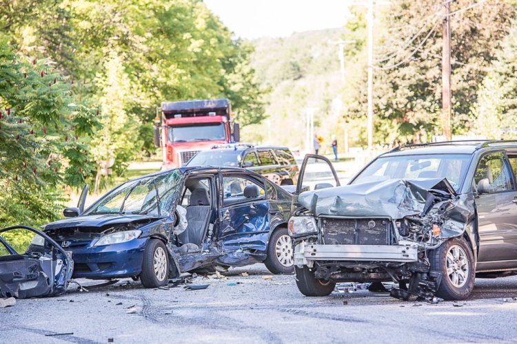 Police said Monday at least one person remains hospitalized after a two vehicle collision at the intersection of North Main and Bucknam streets in Mechanic Falls last Wednesday. 
