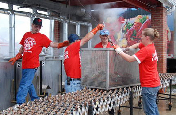 Cookers load another batch at the 71st Lobster Festival in Rockland.