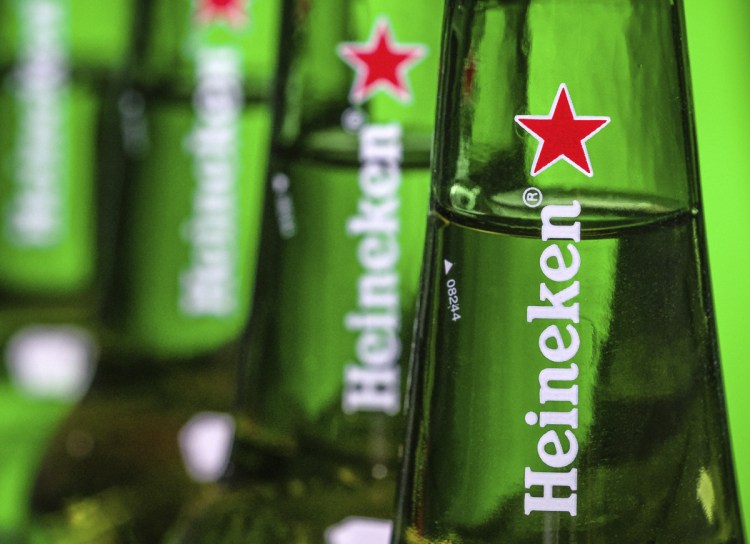 By developing markets in China, Heineken, the world's second-largest brewer, is trying to keep pace with No. 1, Anheuser-Busch InBev.
