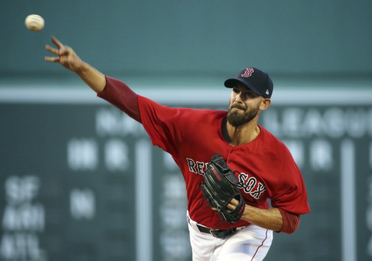Boston's Rick Porcello delivers a pitch to the Yankees Friday night at Fenway Park. Porcello pitched a complete game and allowed one hit in beating New York 4-1 at Fenway Park in a game that lasted just 2 hours, 15 minutes.