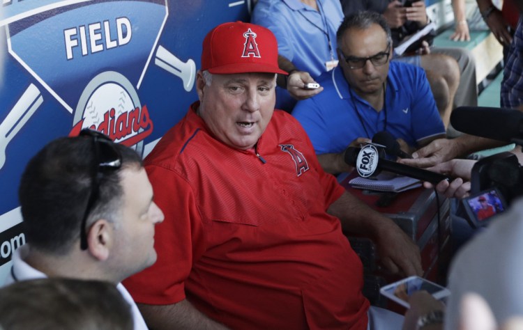 Angels Manager Mike Scioscia denies a report that he will retire at the end of the season, calling it "poppycock." Scioscia has managed the Angels for 19 seasons.