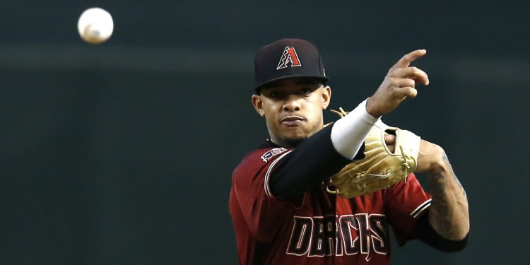 Diamondbacks shortstop Ketel Marte makes a throw during the first inning of Arizona's 6-0 victory over the Phillies on Wednesday in Phoenix.
