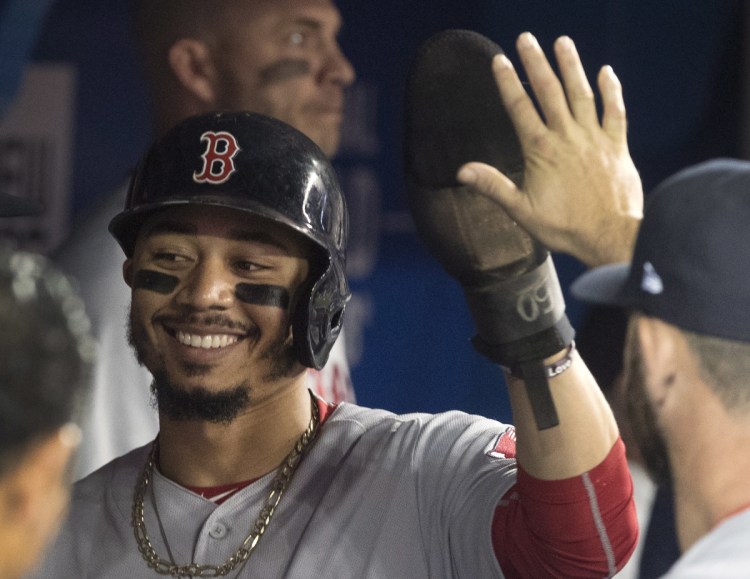 Mookie Betts was 4 for 4 and hit for the first cycle, the first Boston player to do so since Brock Holt three years ago.