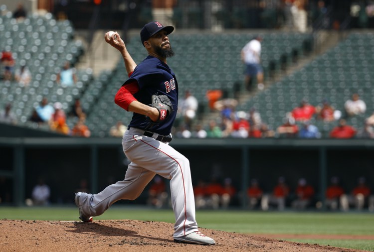 Red Sox starting pitcher David Price pitched six scoreless innings, allowing five hits, while striking out 10 and walking none in Boston's 5-0 win over the Orioles in the first game of a doubleheader on Saturday in Baltimore.