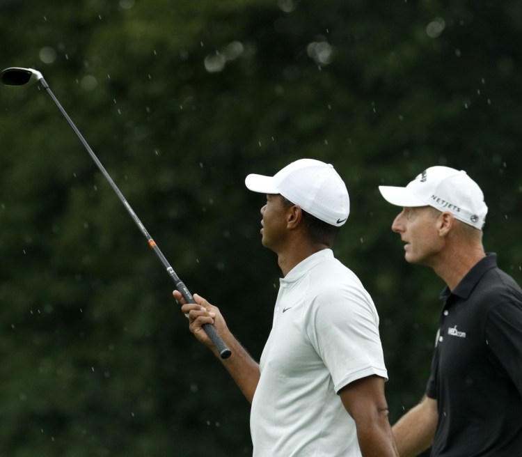 Tiger Woods made an impression on U.S. Ryder Cup captain Jim Furyk, right, in the final round of the PGA Championship on Sunday