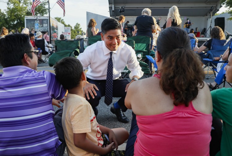 Hamilton County Clerk of Courts Aftab Pureval speaks with constituents as he campaigns for his 1st House District challenge against veteran Republican Rep. Steve Chabot.