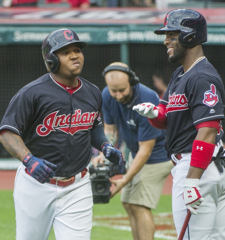 Jose Ramirez of the Cleveland Indians is greeted by Yandy Diaz after hitting a two-run homer Friday night in the first inning of a 2-1 victory against the Baltimore Orioles.