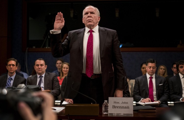 Former CIA director John Brennan testifies before the House Intelligence Committee on the Russia investigation in Washington, D.C., on Tuesday.