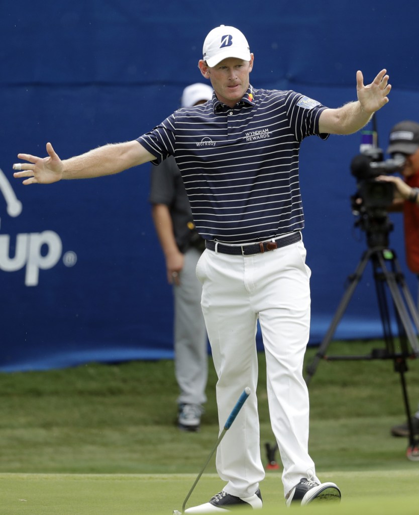 Brandt Snedeker celebrates as he makes a birdie putt on the 18th hole to finish off his victory Sunday in the Wyndham Championship in Greensboro, N.C. Snedeker shot a 5-under 65 in the final round to finish at 21 under, three shots better than C.T. Pan and Webb Simpson.