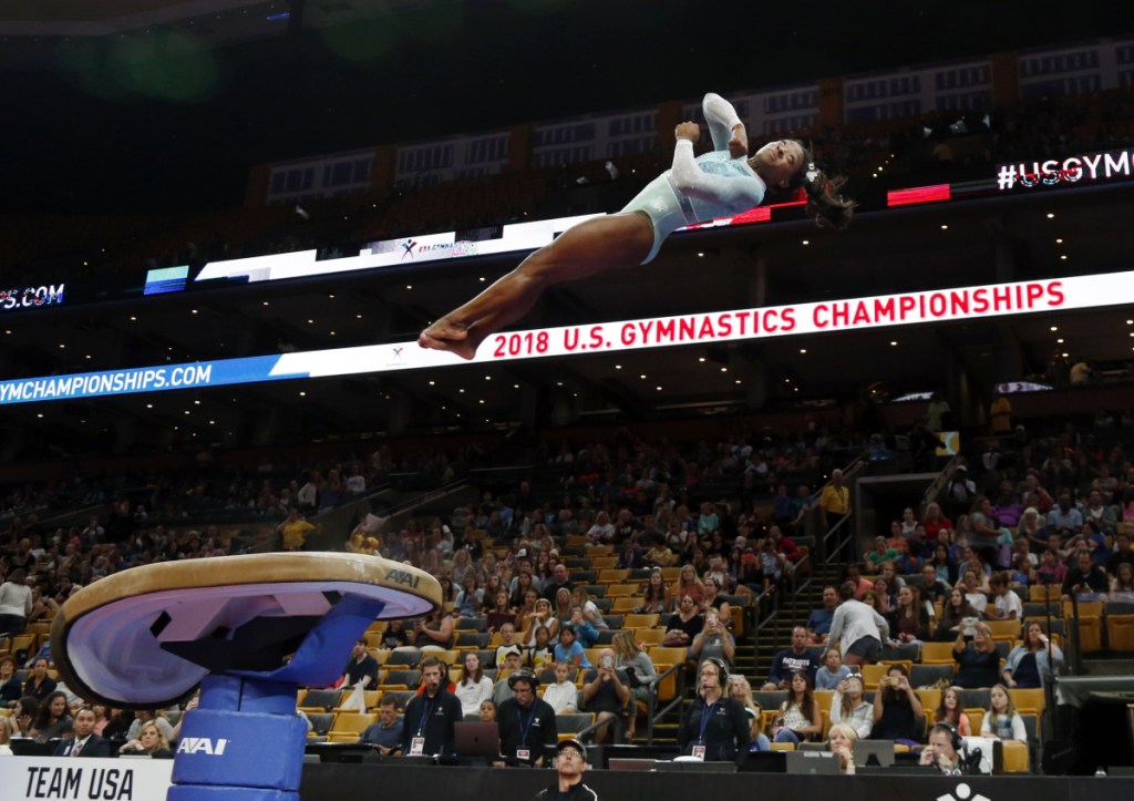 Simone Biles warms up on the vault at the U.S. Gymnastics Championships at Boston's TD Garden on Sunday. (AP Photo/Elise Amendola)