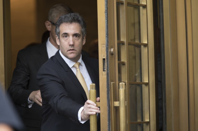 Michael Cohen leaves Federal court Tuesday in New York. Cohen pleaded guilty to charges including campaign finance fraud and his lawyer says he does not want a pardon from Trump.