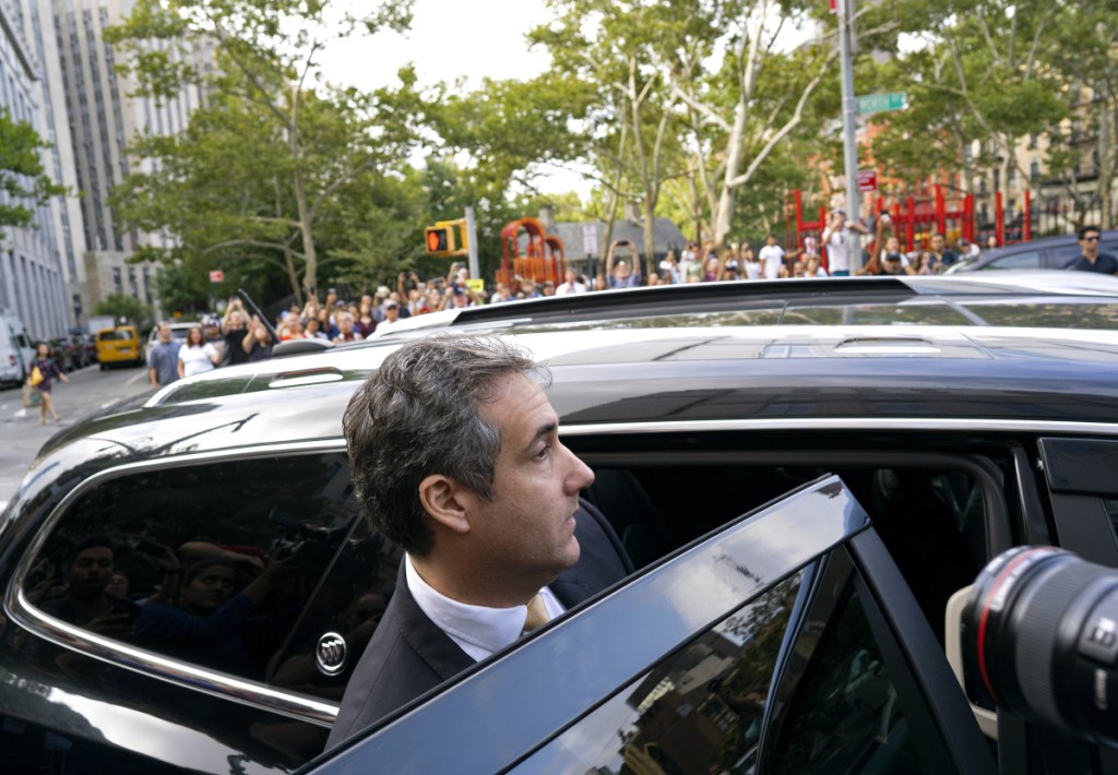 Michael Cohen, former personal lawyer to President Donald Trump, leaves federal court after reaching a plea agreement in New York, Tuesday, Aug. 21, 2018.