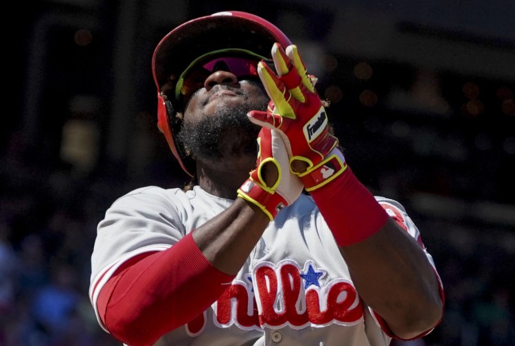 Odubel Herrera of the Philadelphia Phillies claps his hands Thursday while crossing the plate after hitting a two-run homer in the seventh inning – the only runs of the game in the Phils' 2-0 victory against the Washington Nationals.