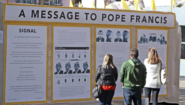 An art installation protesting the pope's visit stands in Dublin on Thursday. Many in Ireland want apologies for the sexual abuse of children by clergy and for the deaths of some 800 children at the Tuam orphanage whose bodies were found in a mass grave.