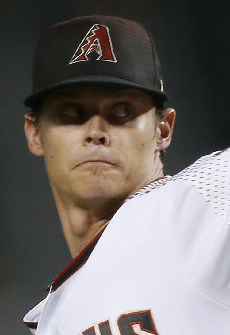 Arizona Diamondbacks starter Clay Buchholz throws a pitch to a  Los Angeles Angels batter during the first inning of a baseball game Wednesday, Aug. 22, 2018, in Phoenix. (AP Photo/Ross D. Franklin)