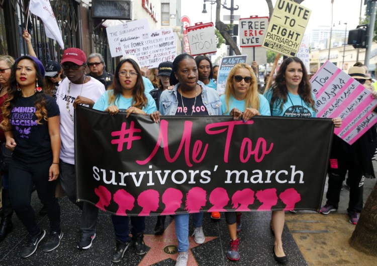 Women take part in a #MeToo March in Los Angeles last year. The movement against sexual harassment continues to roil much of the nation, but many state lawmakers have done nothing to police their own branches of government.