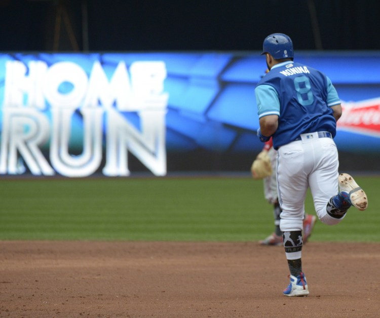 The Blue Jays' Kendrys Morales rounds the bases after hitting a two-run homer in Sunday's 8-3 loss to the Phillies on Sunday. Morales has homered in a team-record seven consecutive games.