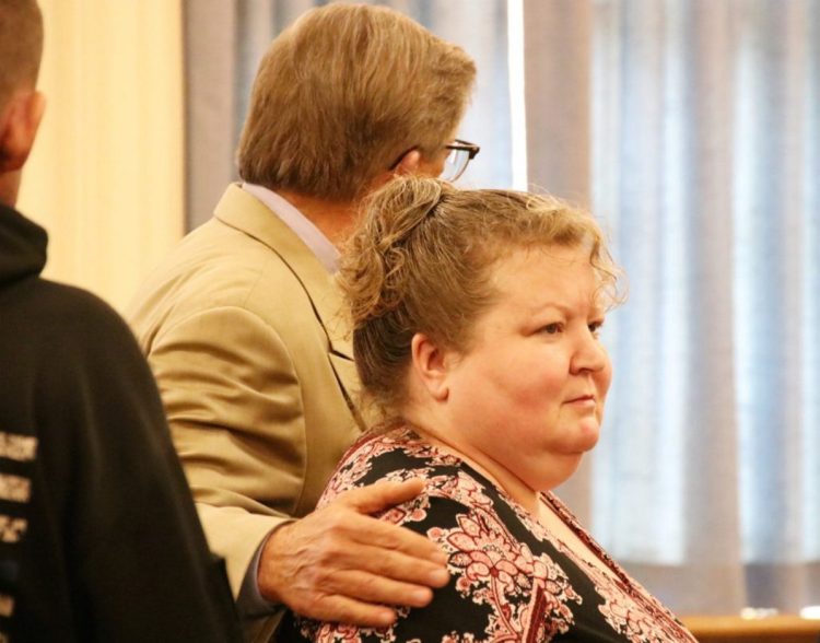 Kandee Collind of Acton, shown in court in August, wants to withdraw her guilty plea to stabbing to death her former husband, Scott Weyland, nearly two years ago. At left is her attorney, Clifford Strike.