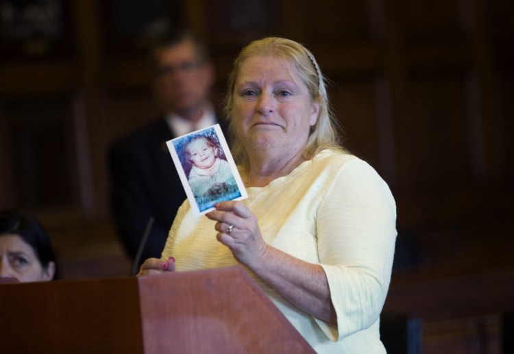 Venus Nappi, Burton Hagar's former wife and the mother of the 4-month-old boy, holds a picture of Nathan during Tuesday's sentencing hearing. "I'd just like you all to know who my son was," she told the court.