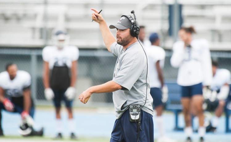 UMaine head coach Joe Harasymiak instructs his team during an intrasquad scrimmage Monday in Orono.