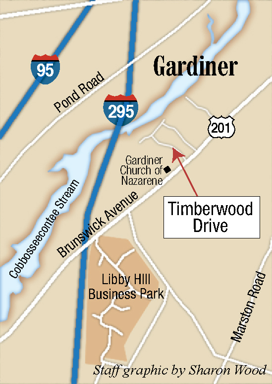 The intersection of Timberwood Drive and U.S. Route 201 in Gardiner, seen Friday, is near where Sturbridge, Massachusetts, resident Gyrth Rutan was pulled over for a traffic stop, he shot himself to death, and police discovered a woman's body in the trunk of the car he was driving.