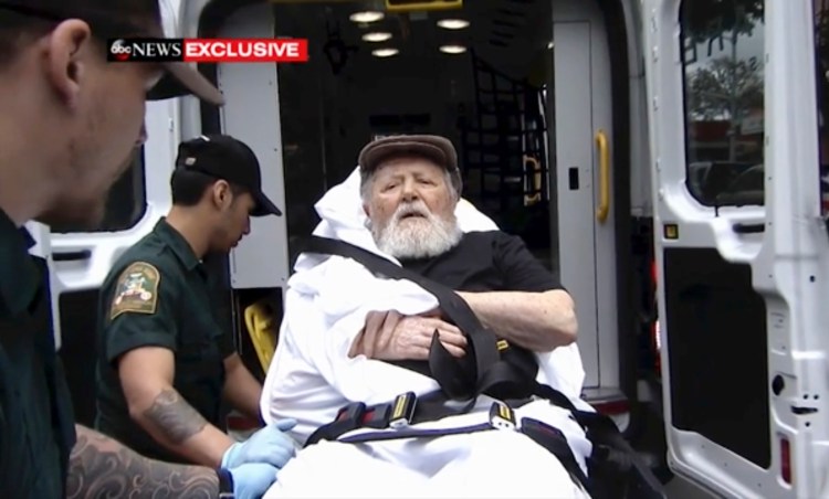 In this Monday, Aug. 20, 2018, frame from video, Jakiw Palij, a former Nazi concentration camp guard, is carried on a stretcher from his home into a waiting ambulance in the Queens borough of New York. Palij, the last Nazi war crimes suspect facing deportation from the U.S. was taken from his home and spirited early Tuesday morning to Germany, the White House said. 