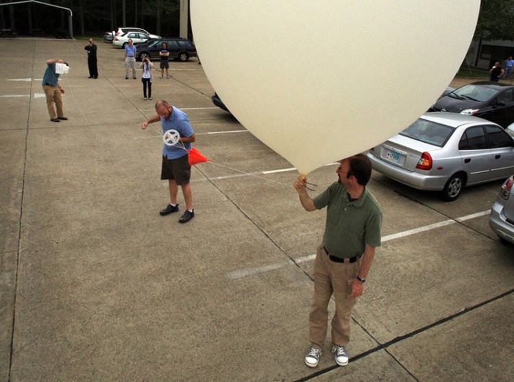 A NASA team prepare to launch one of the ozone-testing 'packages' in Virginia in 2014.