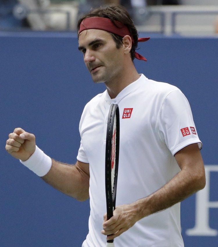 Roger Federer, of Switzerland, celebrates after defeating Benoit Paire, of France, during the second round of the U.S. Open tennis tournament, Thursday, Aug. 30, 2018, in New York. (AP Photo/Kevin Hagen)