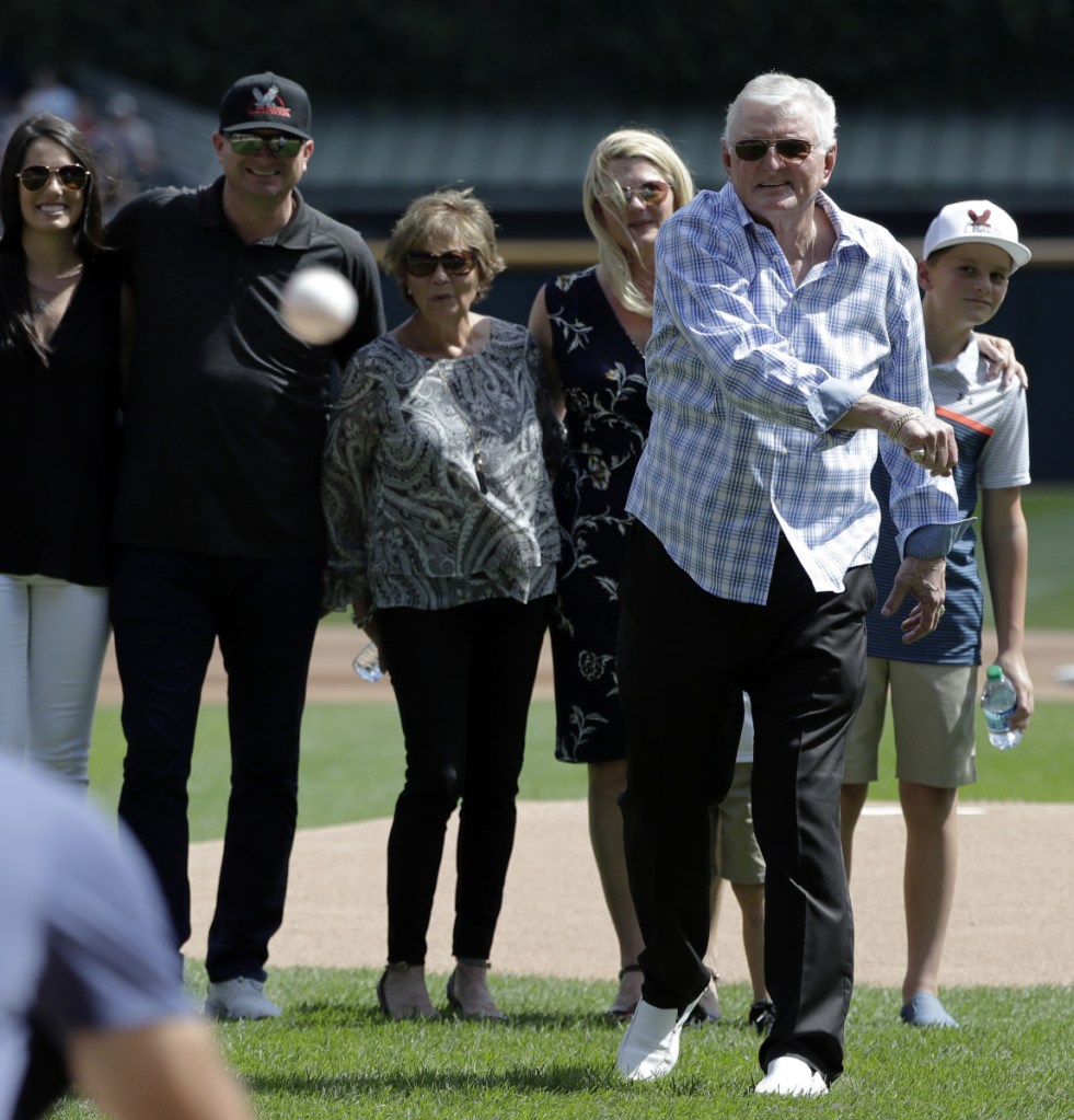 White Sox broadcaster Ken "The Hawk" Harrelson throws out the first pitch before Sunday's game between the Red Sox and White Sox. Harrelson, a former Red Sox outfielder, is retiring after this season and had a day in his honor Sunday.
