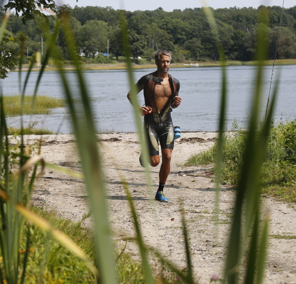 John Stevens, who will compete Monday in the swimrun world championship endurance race, has been training on Little Diamond Island – part of a Casco Bay he knows intimately.