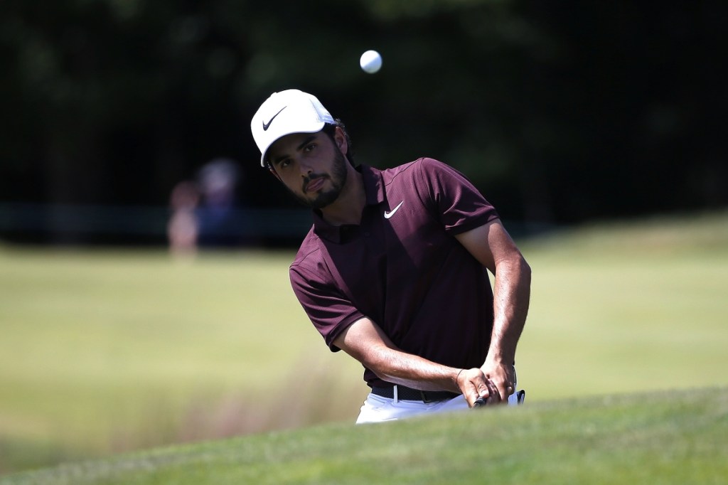 Abraham Ancer chips onto the second green Sunday during the third round of the Dell Technologies Championship in Norton, Mass., Sunday, Sept. 2, 2018. Ancer shot a 6-under 65 to move to the top of a crowded leaderboard.