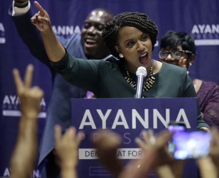 Boston City Councilor Ayanna Pressley celebrates her victory Tuesday over U.S. Rep. Michael Capuano. "With our rights under assault, with our freedoms under siege, it isn't good enough to see Democrats back in power, but it matters who those Democrats are," Pressley said.