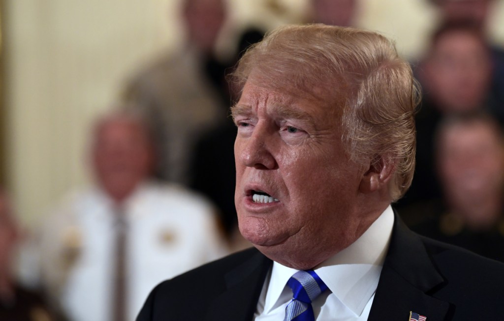 President Trump, seen responding to a reporter's question during an event Wednesday at the White House, was "absolutely livid" about the New York Times opinion piece titled, "I Am Part of the Resistance Inside the Trump Administration."