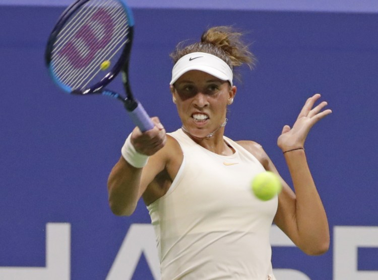 Madison Keys beat Carla Suarez Navarro in straight sets on Wednesday night to advance to the semifinals of the U.S. Open in New York. The 14th-seeded Keys, a finalist a year ago, faces No. 20 Naomi Osaka in the semifinals.