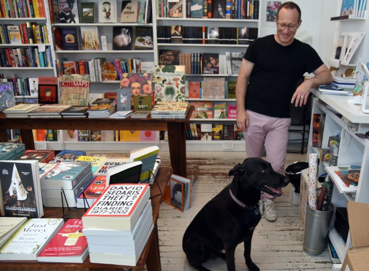 One way that Greedy Reads in Fells Point, Md., makes the buying experience personal is by allowing bookstore customers like Dr. John Krakauer to bring their leashed dogs.