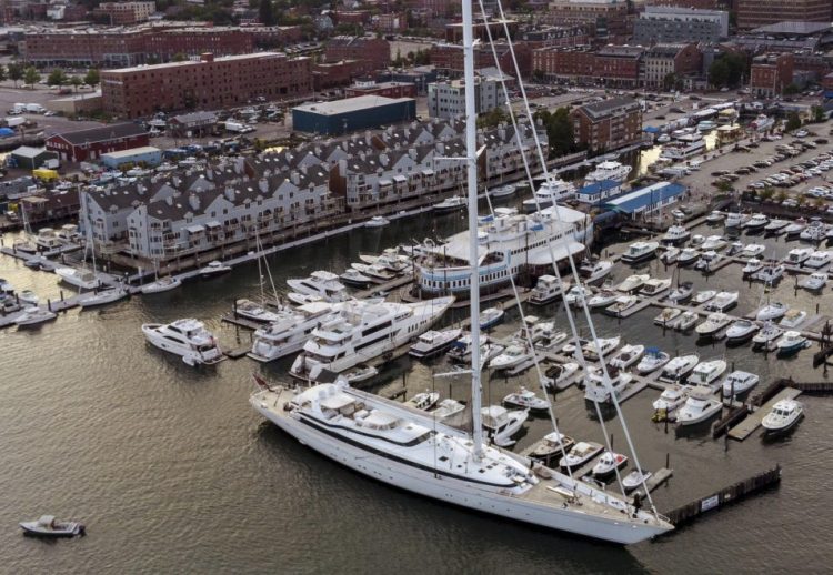 The M5, the largest single-masted yacht ever built, dwarfs other boats at DiMillo's Marina in Portland. The luxury yacht measures 277 feet long by 54 feet wide and comfortably sleeps 12. The vessel has room for a smaller yacht held inside its hull, and deck space for a small float plane.