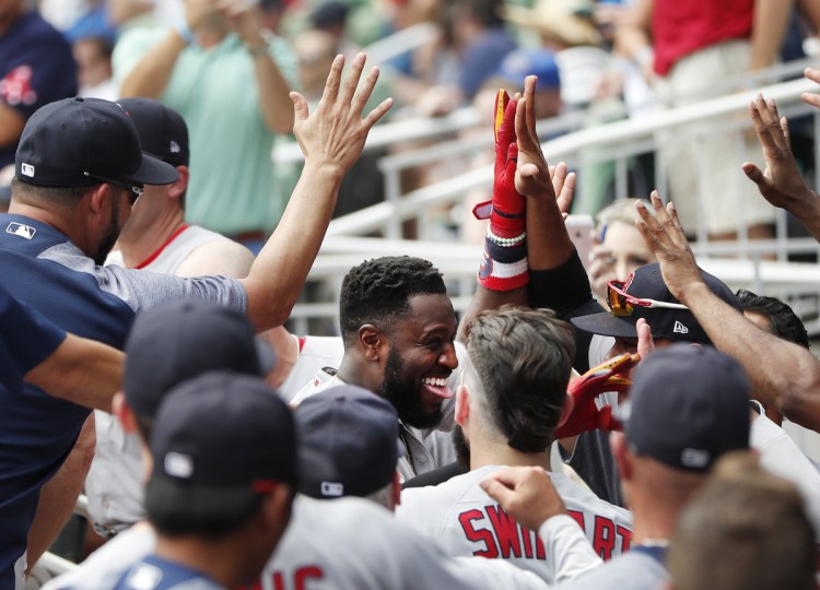 Brandon Phillips was playing his first game in the majors this season Wednesday, and came through with a homer in the ninth inning that capped a massive comeback by the Red Sox in Atlanta.
