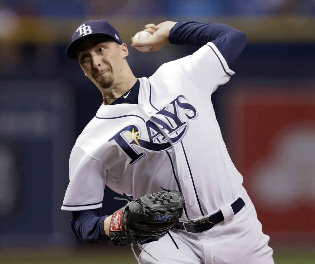 Tampa Bay's Blake Snell beat the Baltimore Orioles Friday night for his 18th victory of the season. Snell matched Cleveland's Corey Kluber for the major league lead in wins.