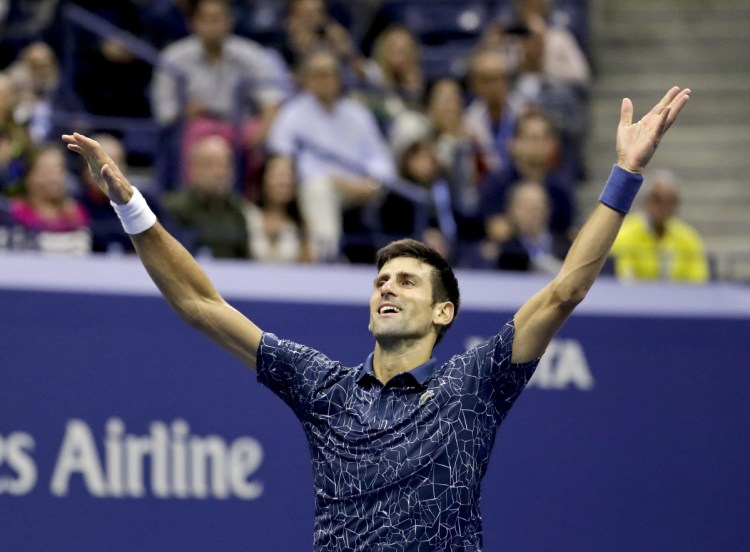 Novak Djokovic celebrates after defeating Juan Martin del Potro to win the U.S. Open men's title, 6-3, 7-6 (4), 6-3, on Sunday in New York.