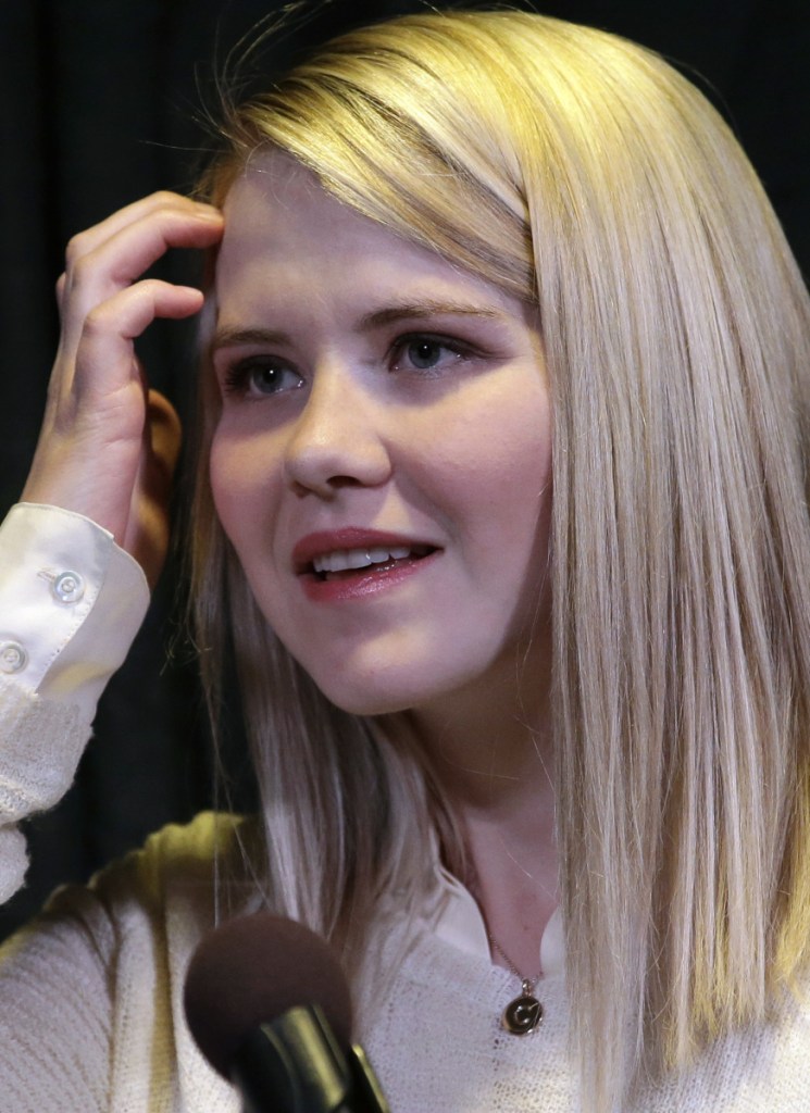 In this April 24, 2015, file photo, kidnapping survivor Elizabeth Smart looks on during a news conference in Sandy, Utah. Wanda Barzee, a woman convicted of helping a former street preacher kidnap Smart in 2002 will be freed from prison more than five years earlier than expected, a surprise decision that Smart called "incomprehensible" on Tuesday.