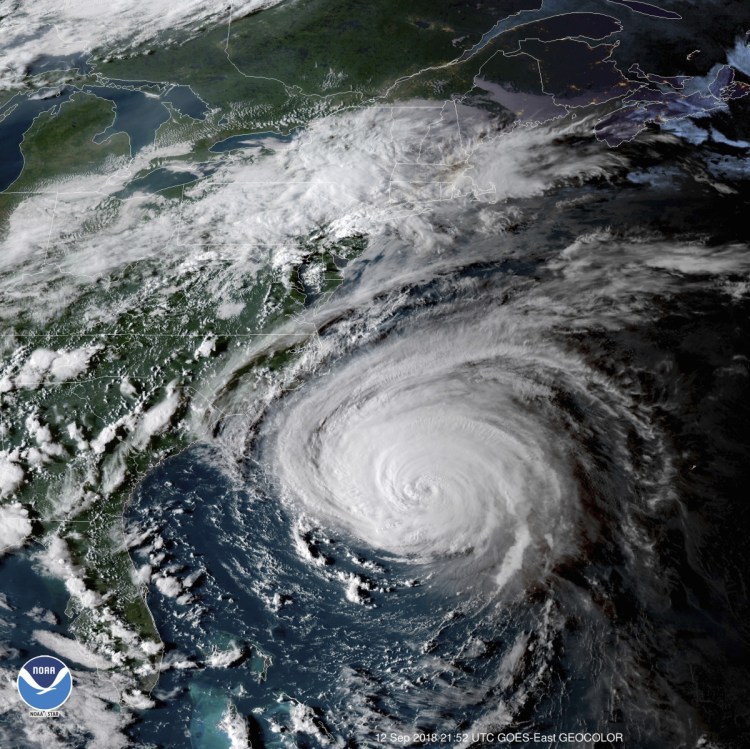 This enhanced satellite image made available by the National Oceanic and Atmospheric Administration shows Hurricane Florence off the eastern coast of the United States on Wednesday at 5:52 p.m. 