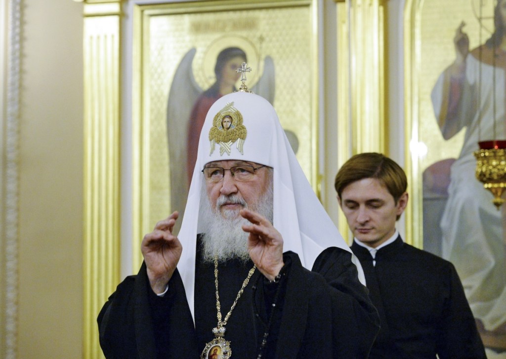 Russian Orthodox Church Patriarch Kirill presides over a meeting of the church's Holy Synod of the Russian Orthodox Church in Moscow on Friday. The Russian church has been working on a response to its Ukraine counterpart, which is pressing ahead with a move toward independence.